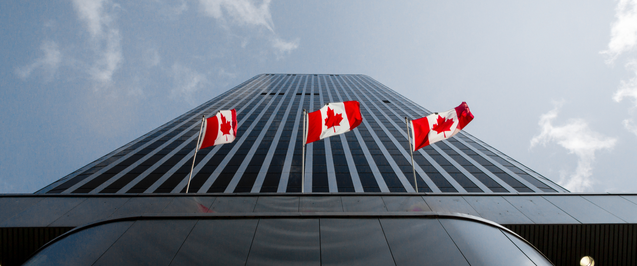 Canadian flag on building.